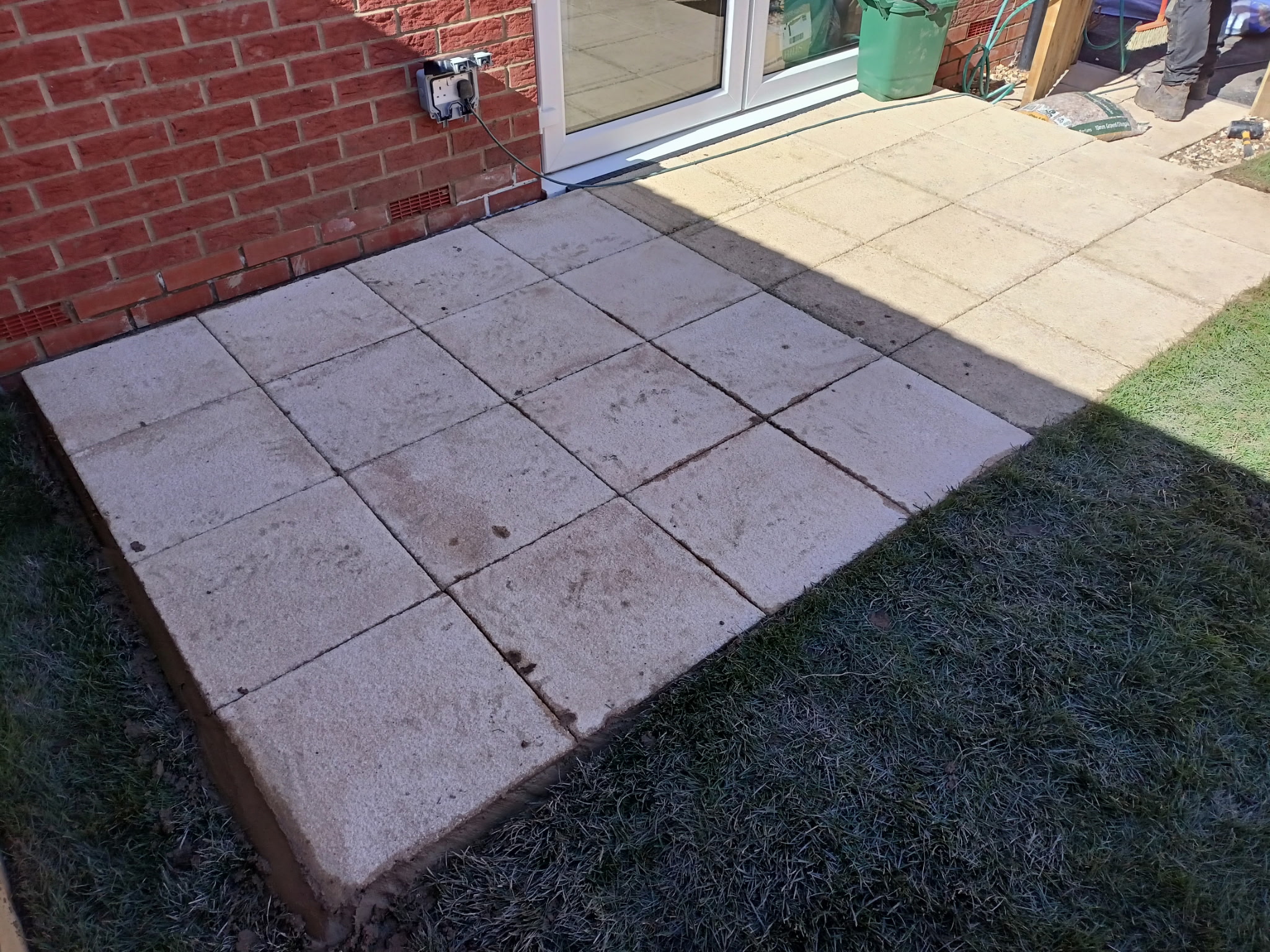 Patio slabs beside house